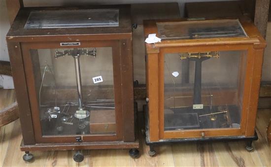 A Griffin & George lab balance, in cabinet with weights, chrome and a Stanton Instruments lab balance, in cabinet with weights, brass